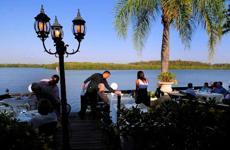 Restaurant with water views | Siesta Key 1BR