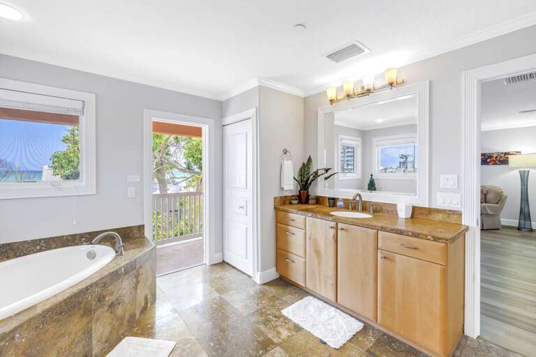 En-suite bath with spot tub and Ocean views