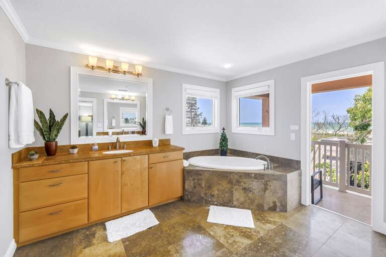 En-suite bath with spot tub and Ocean views