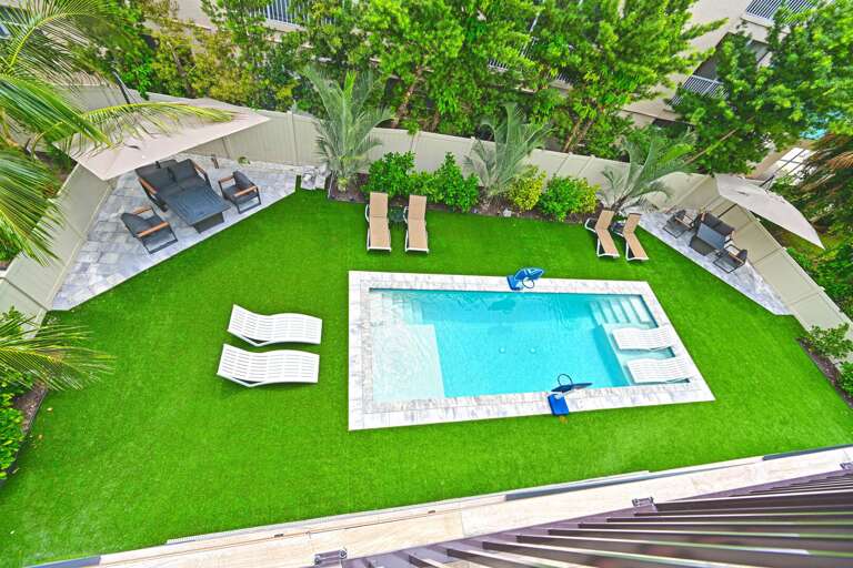 Aerial view of resort-style pool – Siesta Key vacation rental.