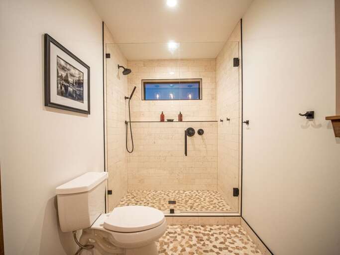 Main level master bathroom with walk in shower