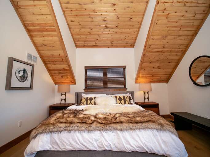 Upper level master bedroom with attached private bathroom