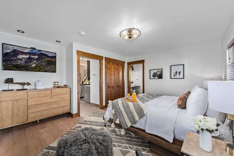 Main level master bedroom with attached private bathroom