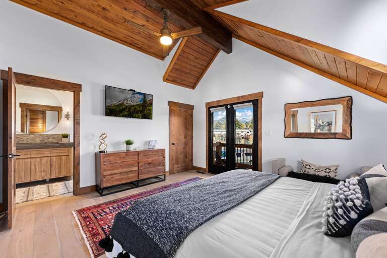 Upper level master bedroom with attached private bathroom