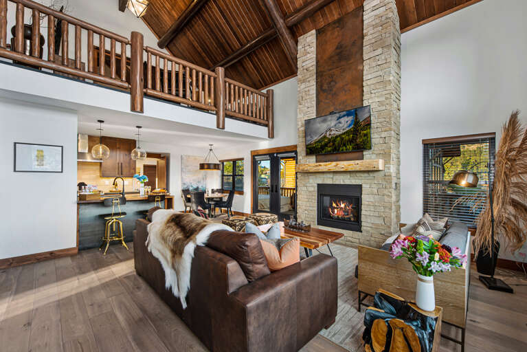 Living area with 25 foot tall fireplace and 50 inch smart TV Living area with 25 foot tall fireplace and 50 inch smart TV