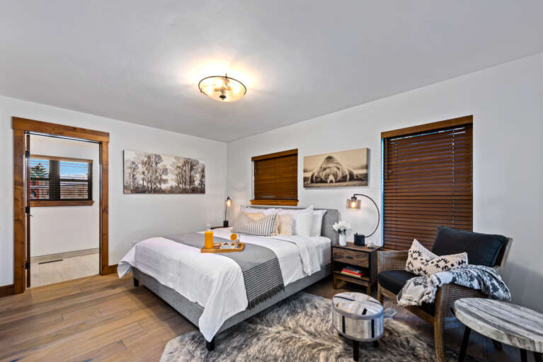 Main level master bedroom with attached private bathroom Main level master bedroom with attached private bathroom