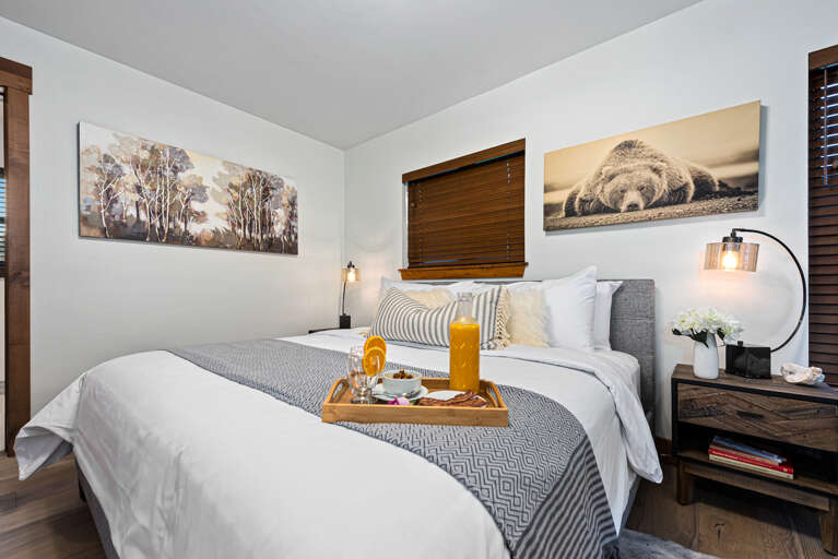 Main level master bedroom with attached private bathroom Main level master bedroom with attached private bathroom