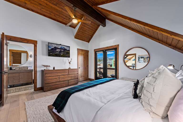 Upper level master bedroom with attached private bathroom