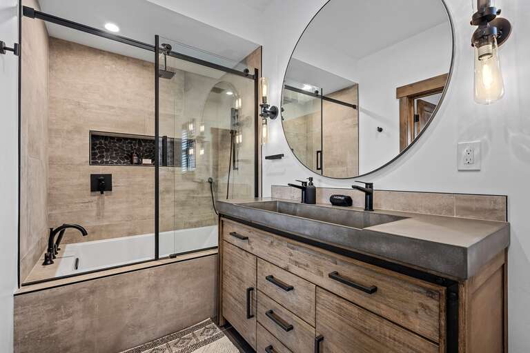 Main level master bathroom with tub