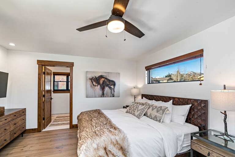 Main level master bedroom with attached private bathroom