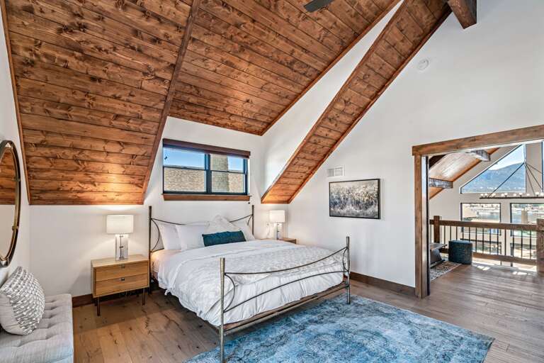 Upper level master bedroom with attached private bathroom