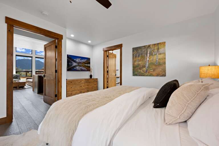 Main level master bedroom with attached private bathroom and 50 inch smart TV Main level master bedroom with attached private bathroom and 50 inch smart TV