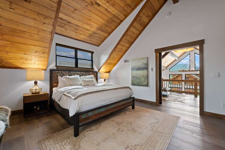 Upper level master bedroom with attached private bathroom Upper level master bedroom with attached private bathroom