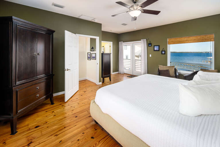 Master bedroom with TV and private bathroom