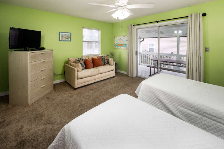 Second bedroom with balcony and queen size sleeper sofa