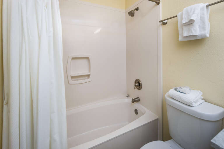 Second full size bathroom with shower/tub combo
