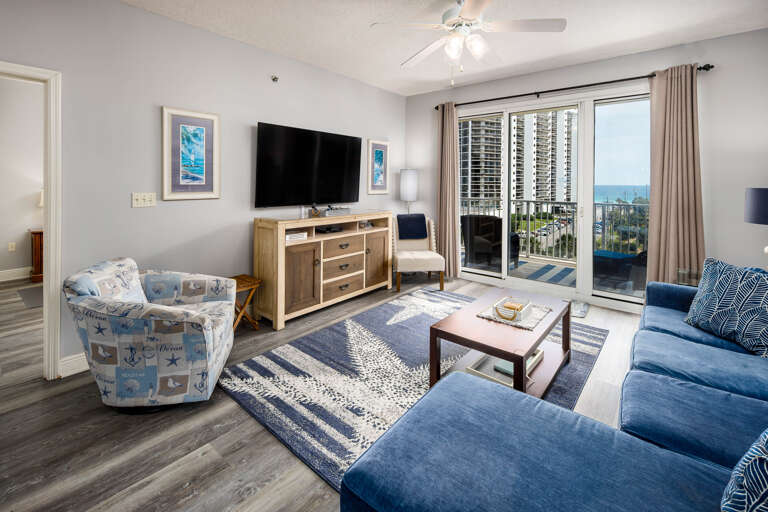 Living room with TV and outdoor views