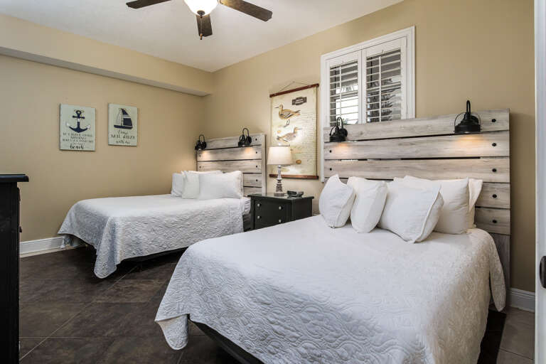 Second bedroom with two full size beds