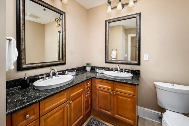 Second bathroom with double vanities