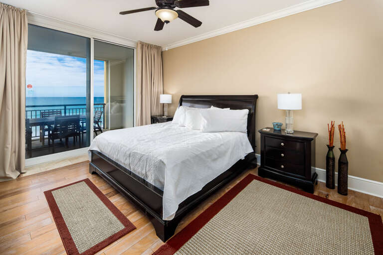 Master bedroom with king size bed and private bathroom