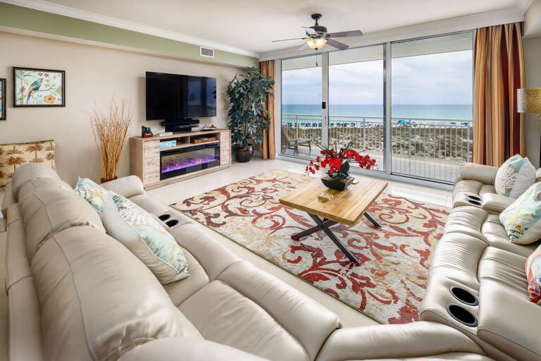 Living room with TV and balcony access