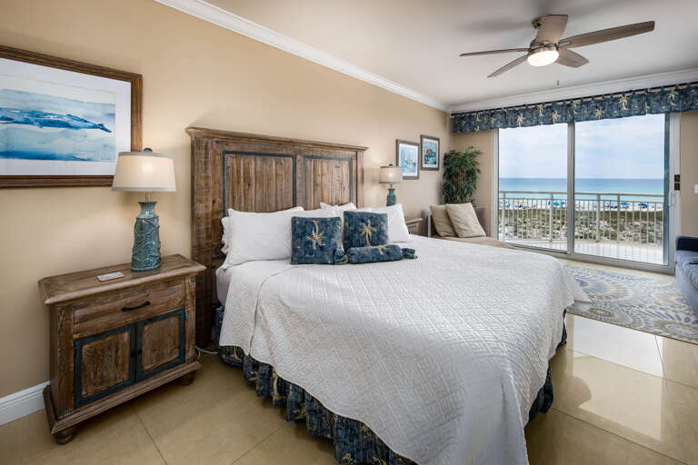Master bedroom with king size bed and beach views