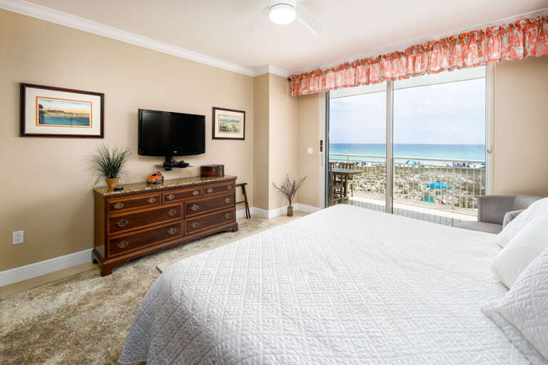 Second master bedroom with TV and balcony access