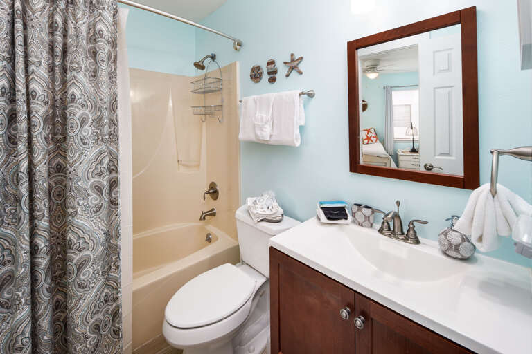 Second full size bathroom with shower/tub combo