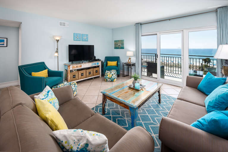 Living room with TV and balcony access
