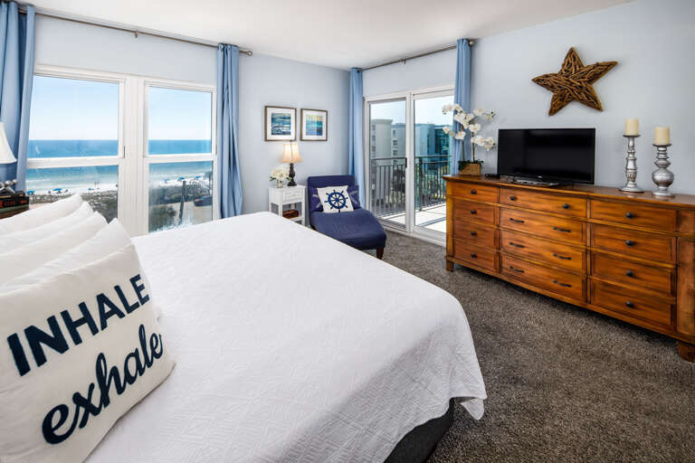 Master bedroom with TV and beach views