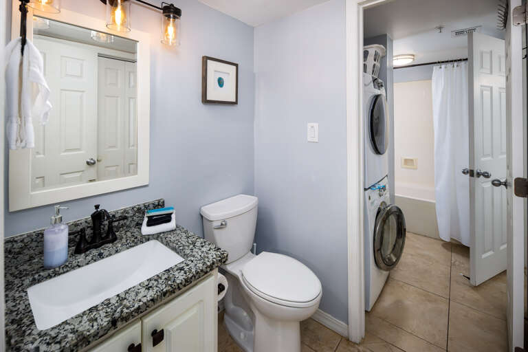 Bathroom with washer and dryer area Bathroom with washer and dryer area