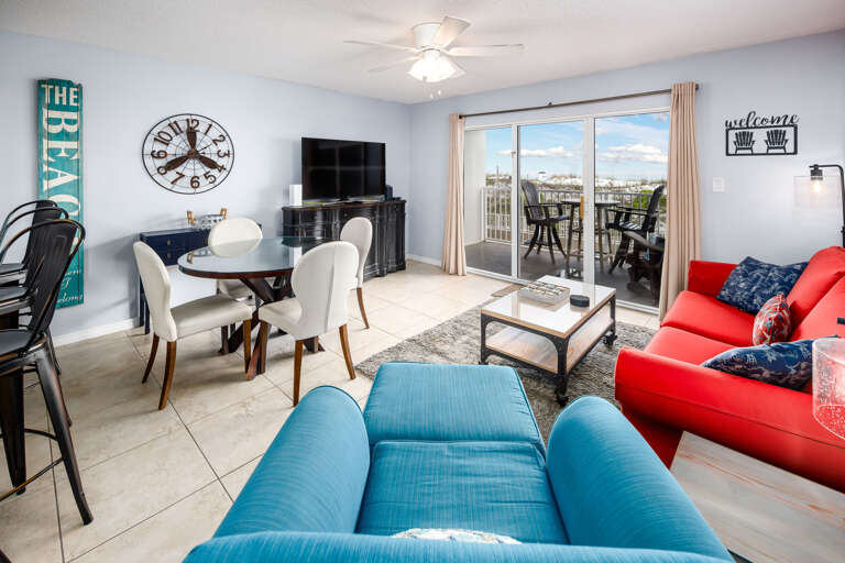 Living room with TV and balcony access Living room with TV and balcony access