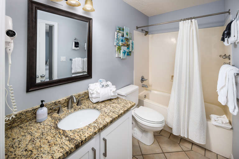 Second full size bathroom with shower/tub combo