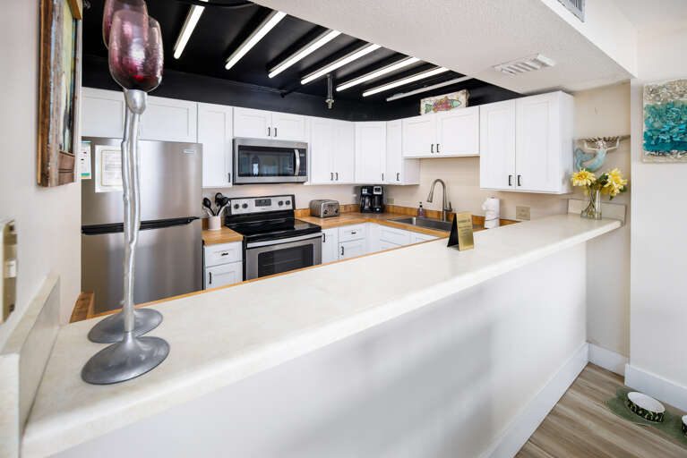 Pass thru Kitchen is open to Living Spaces
