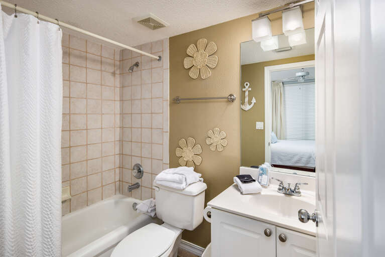 Second full size bathroom with shower/tub combo