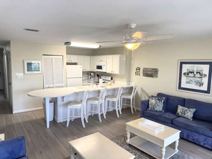 Fully stocked kitchen with breakfast bar