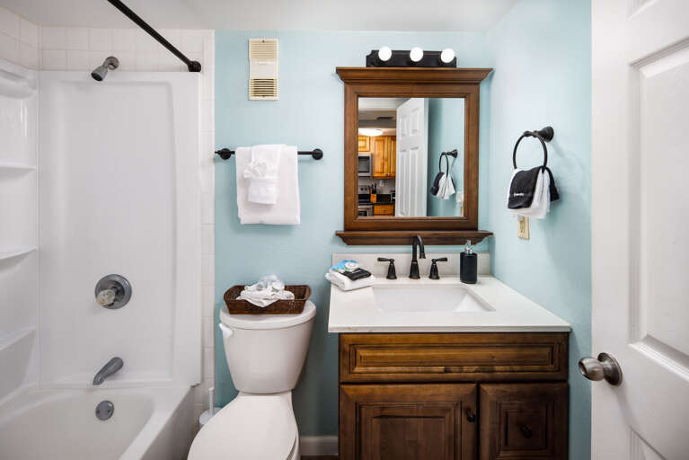 Second full size bathroom with shower/tub combo