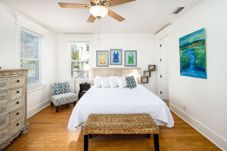 Second floor master bedroom with king size bed and balcony access Second floor master bedroom with king size bed and balcony access