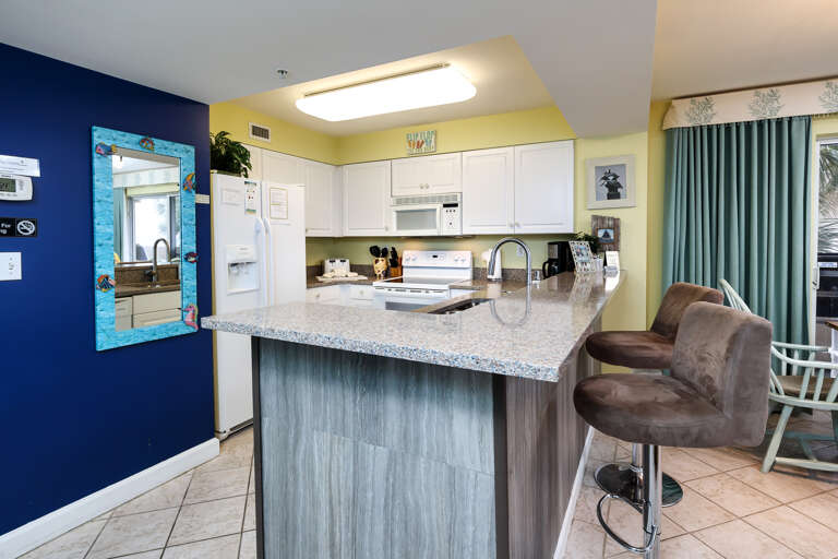 Kitchen Island includes convenient Breakfast Bar