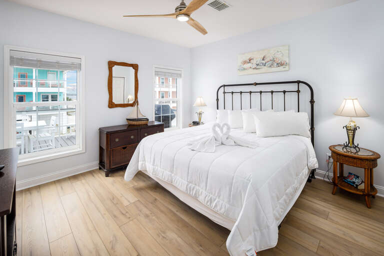 Master bedroom with king size bed on the first level