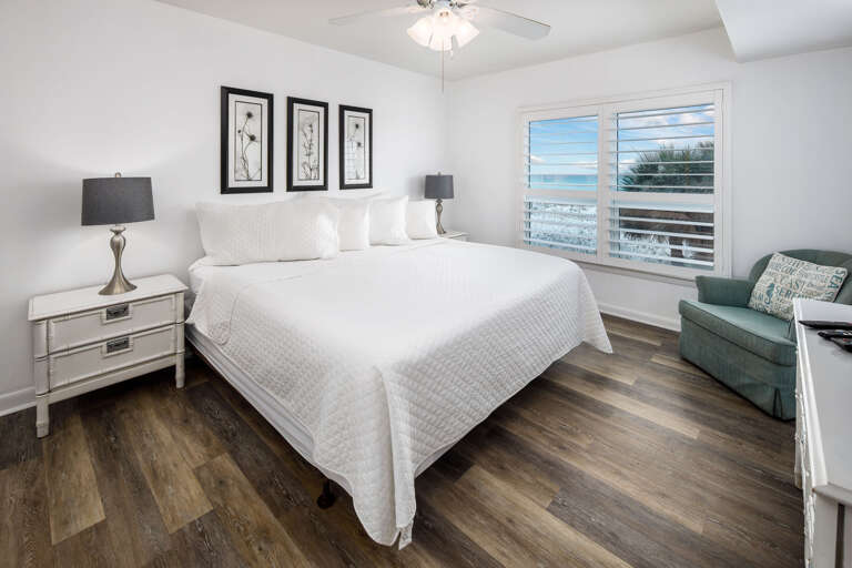 The master bedroom has a large king bed The master bedroom has a large king bed