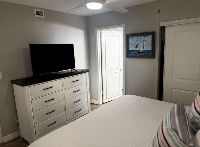 Second bedroom with TV and bathroom access