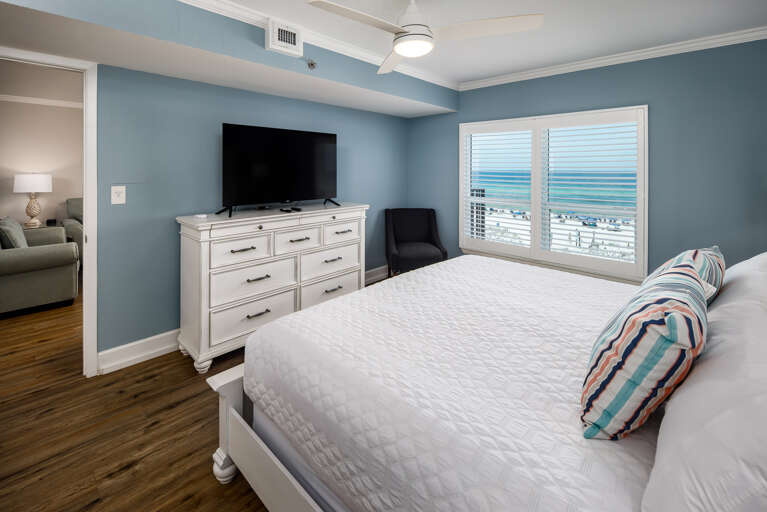 Master bedroom with TV and beach views