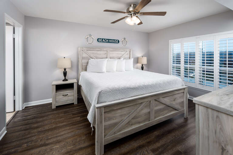 Master bedroom with a king sized bed Master bedroom with a king sized bed