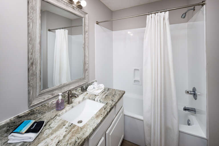 Side A Second full bathroom with shower/tub combo Side A Second full bathroom with shower/tub combo