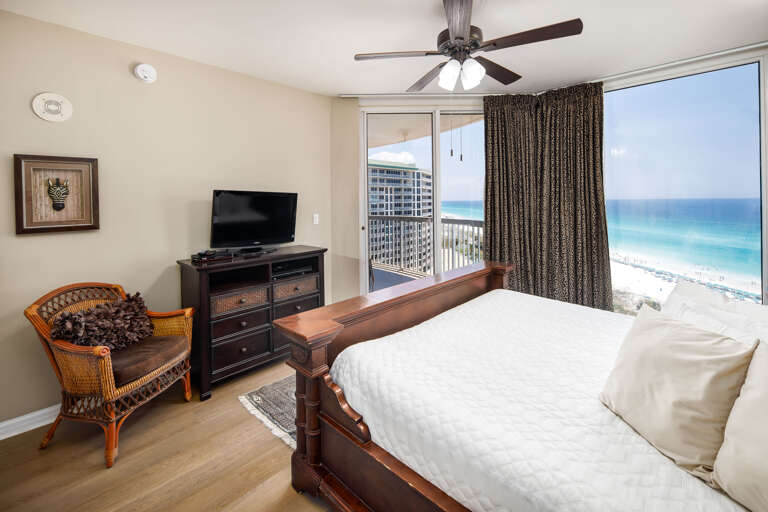 Master bedroom with beach views and balcony access