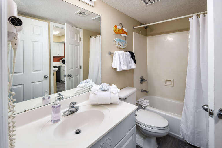 Second full size bathroom with shower/tub combo