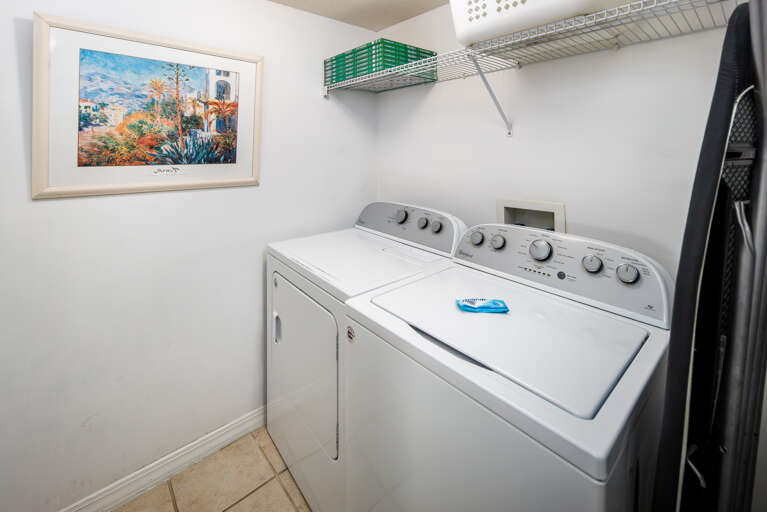 Laundry room with full size washer and dryer