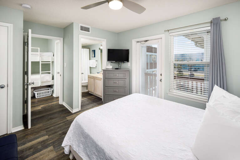 Master bedroom with TV and private bathroom Master bedroom with TV and private bathroom
