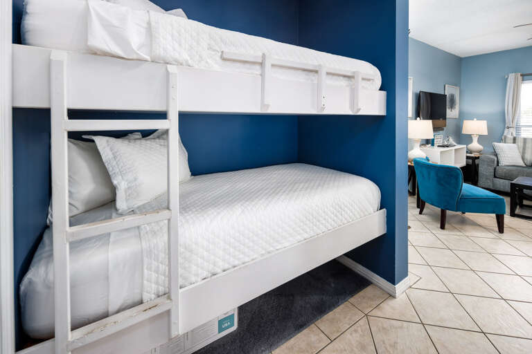 Twin size bunk bed cove in the hallway